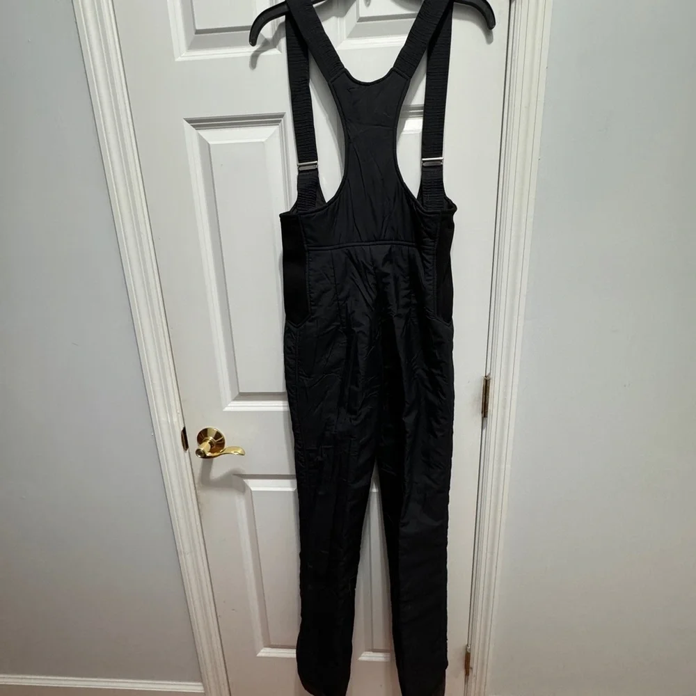 FERA size 10 black ski overalls made in Hong Kong